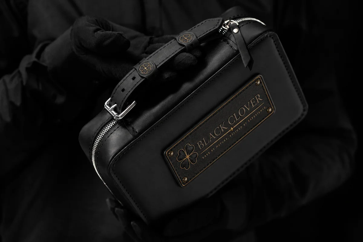 The Black Order travel case in black leather with brass plaque